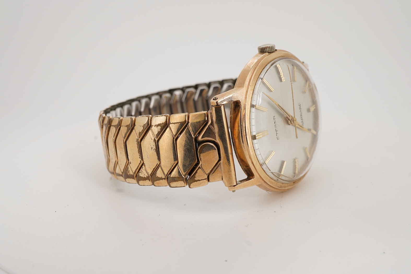 A gentleman's late 1960's 9ct gold Eterna manual wind wrist watch, retailed by Garrard